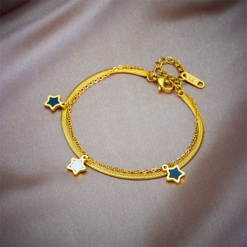 Bracciale con ciondolo a stella bicolore minimalista in acciaio al titanio per donna