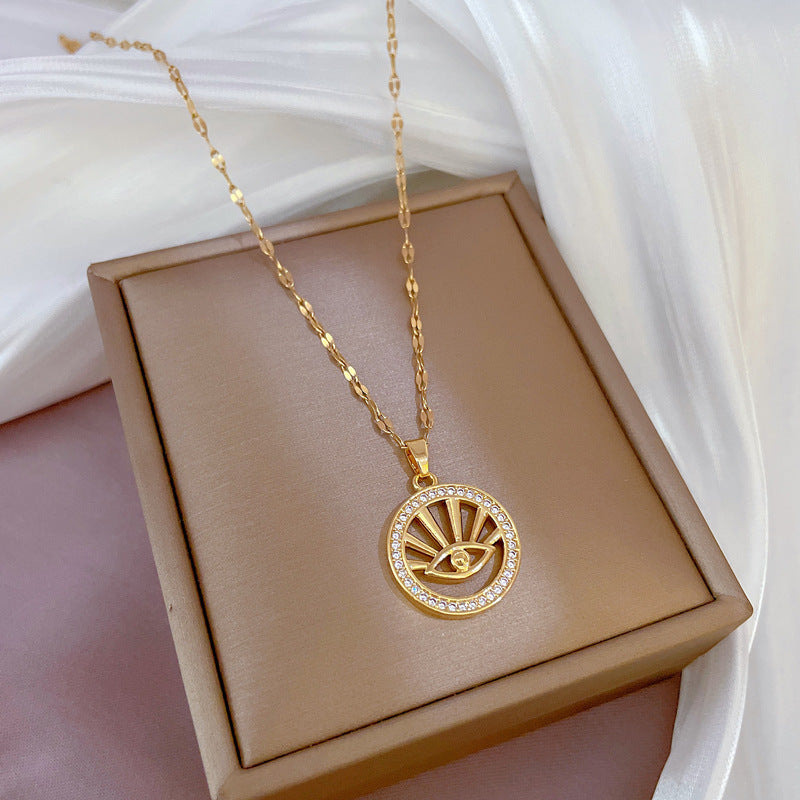 Collana Minimalista Geometrica in Acciaio al Titanio con Ciondolo Occhio di Allah in Zirconia Micro-Incastonata e Dettaglio in Rame Placcato Oro