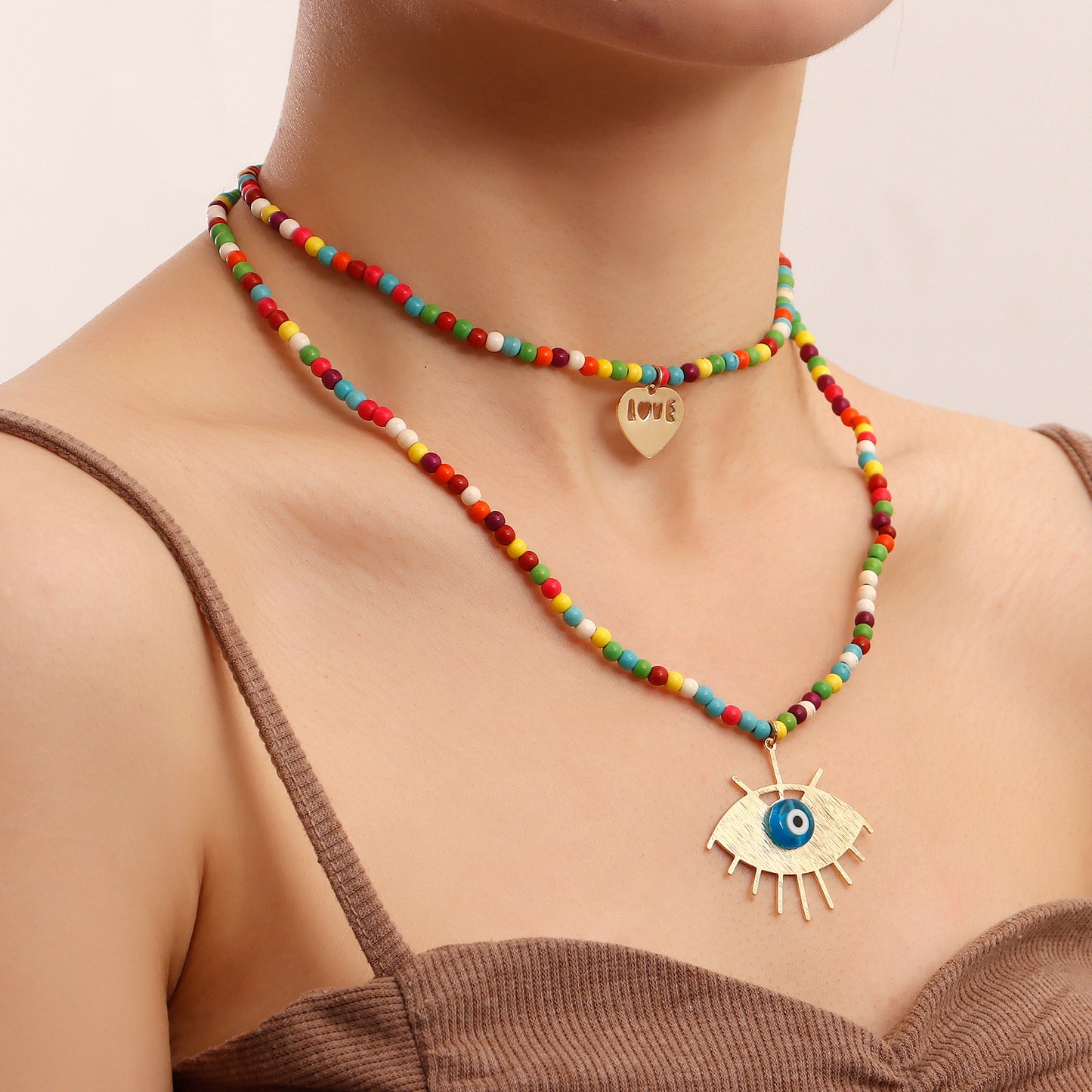Collana con ciondolo a strati da donna in turchese geometrico con occhio di demone e catena in lega placcata