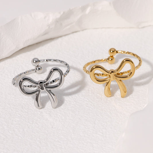 Anillo abierto de acero inoxidable con forma de lazo y baño de oro para mujer