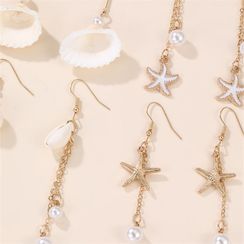 Pendientes largos de borla con colgante minimalista de estrella de mar y concha marina para niñas hechos de resina plástica