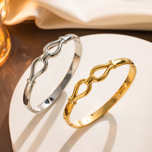 Bracciale Minimalista in Acciaio al Titanio con Placcatura Sottovuoto e Finitura Lucida Design Ovale Geometrico