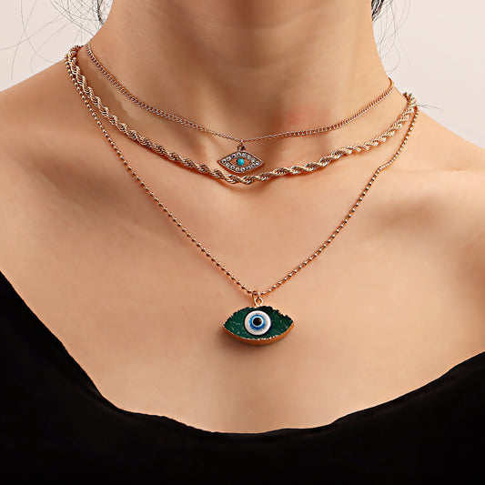 Collana Pendente Occhio di Allah Geometrico Minimalista in Lega con Galvanizzazione su Catena Intrecciata da Donna
