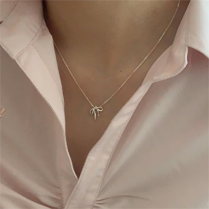 Minimalist Bow Knot Pendant Necklace in 925 Sterling Silver with Plated Finish on Cross Chain