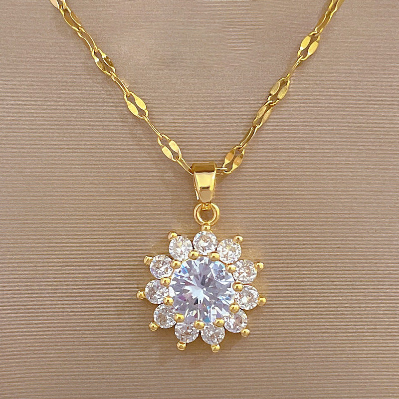 Set di collana e orecchini a girasole geometrico in acciaio al titanio placcato di lusso