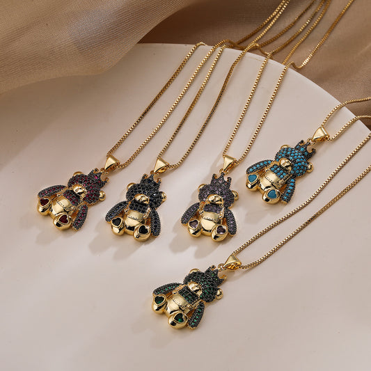 Collar con colgante de cobre minimalista con forma de oso, chapado en oro de 18 quilates y acentos de circonita para mujer