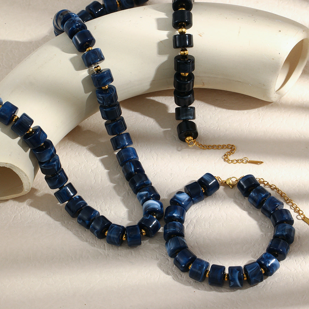 Collana cilindrica retrò minimalista in acrilico da donna con design geometrico e finitura ecologica