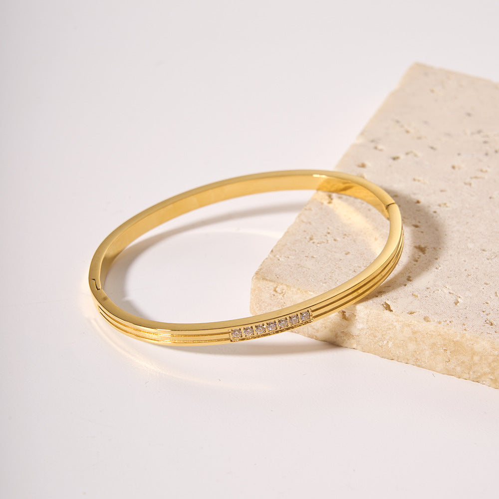 Bracciale Minimalista Lusso in Acciaio Inossidabile Placcato Oro 18K con Design Geometrico Monofila di Zirconi per Donna