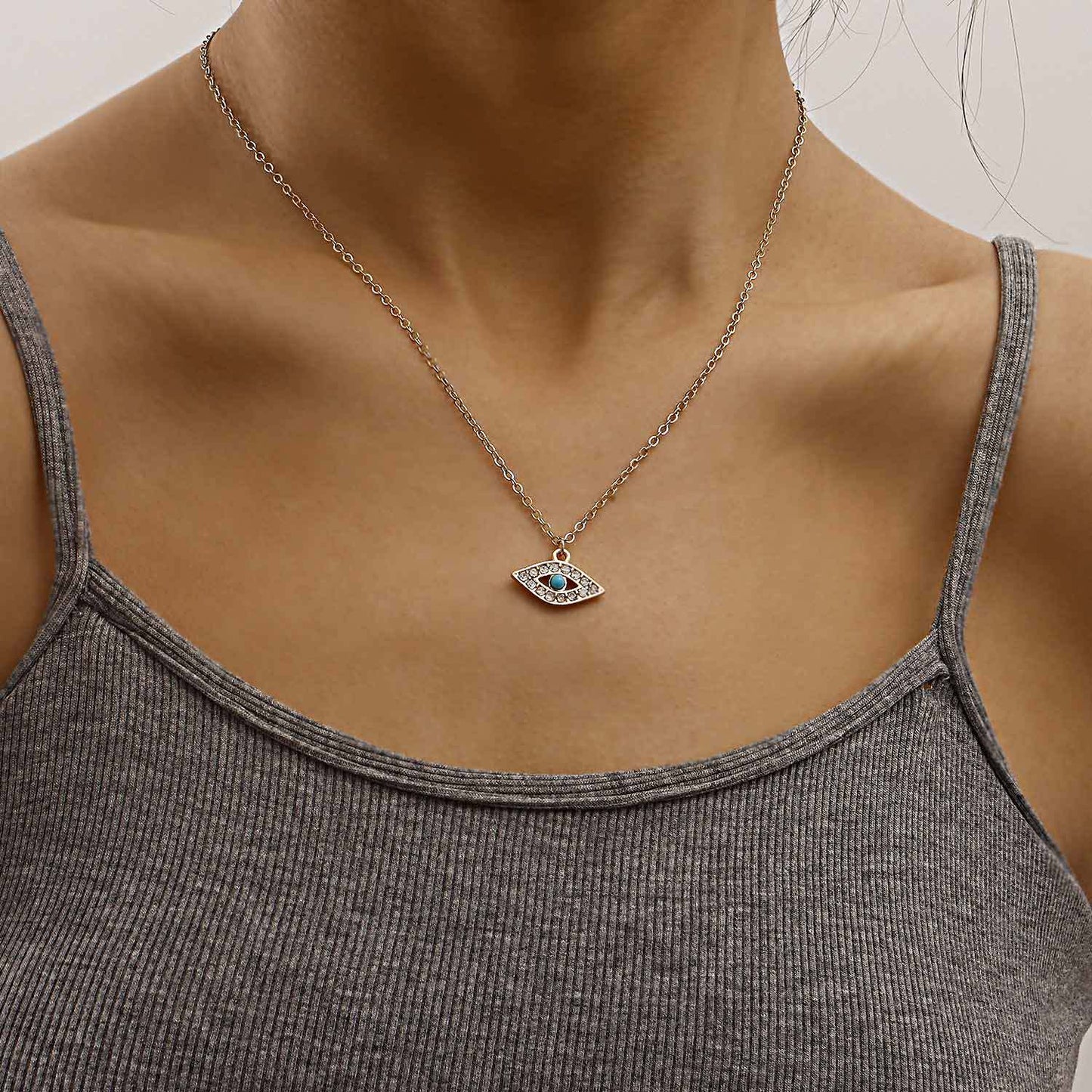 Punk Vintage Geometric Evil Eye Pendant Necklace for Women with Alloy Body, Rhinestone Inlay, and Plated Finish on Delicate Clavicle Chain