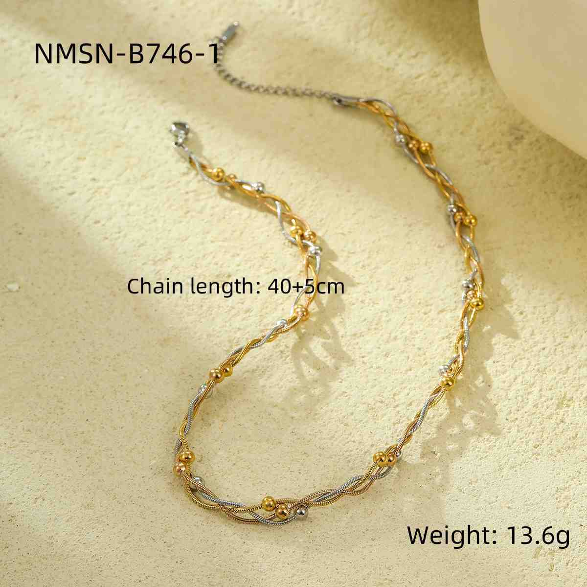 Collar de cadena de serpiente de acero de titanio minimalista y moderno con diseño entrelazado de cuentas para mujer