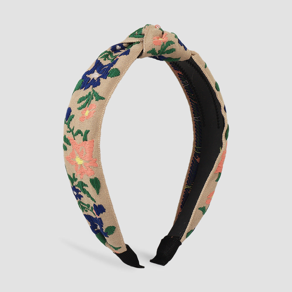 Diadema minimalista de tela para mujer con motivo floral y de hojas bordado