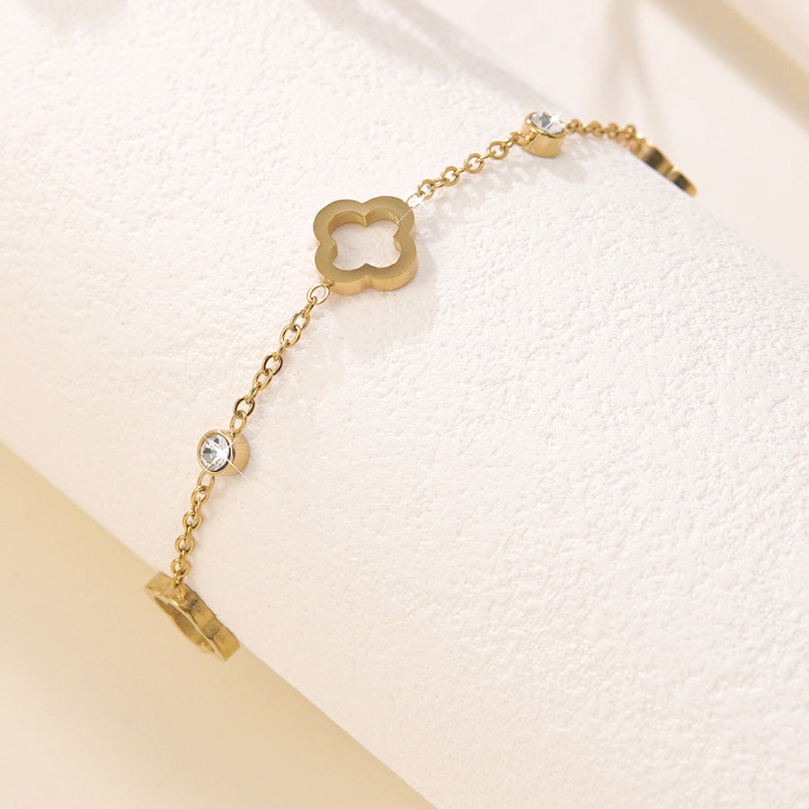 Elegante Bracciale Minimalista da Donna in Acciaio Inossidabile Placcato Oro con Zirconi e Quadrifoglio