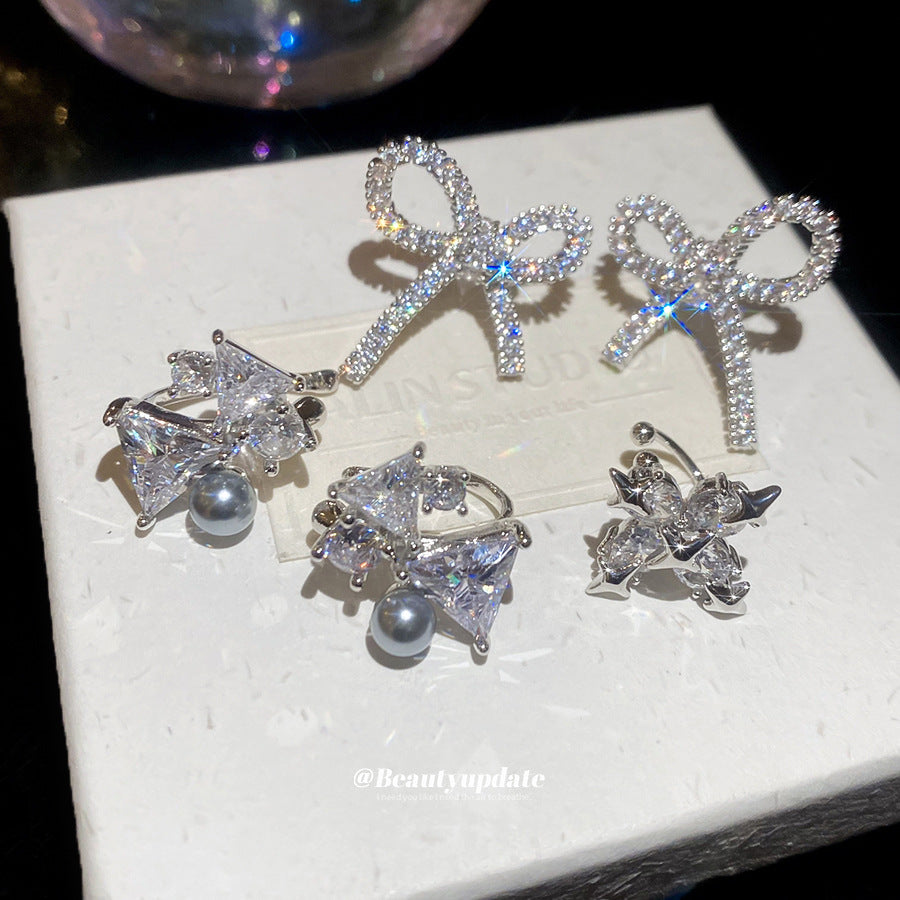 Orecchini a clip di lusso a forma di fiocco geometrico da donna con intarsio in zircone in rame