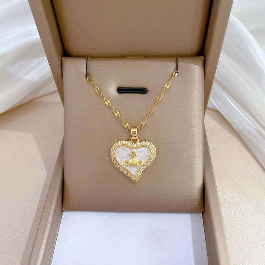 Collar minimalista con colgante de corazón y planeta para mujer y hombre con incrustaciones de circonita en cadena de serpiente de acero de titanio