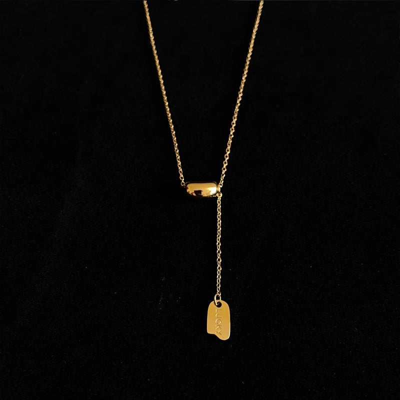 Collar con colgante semiredondo geométrico de diseño original en acero titanio con chapado al vacío de oro de 18 quilates para mujer y hombre