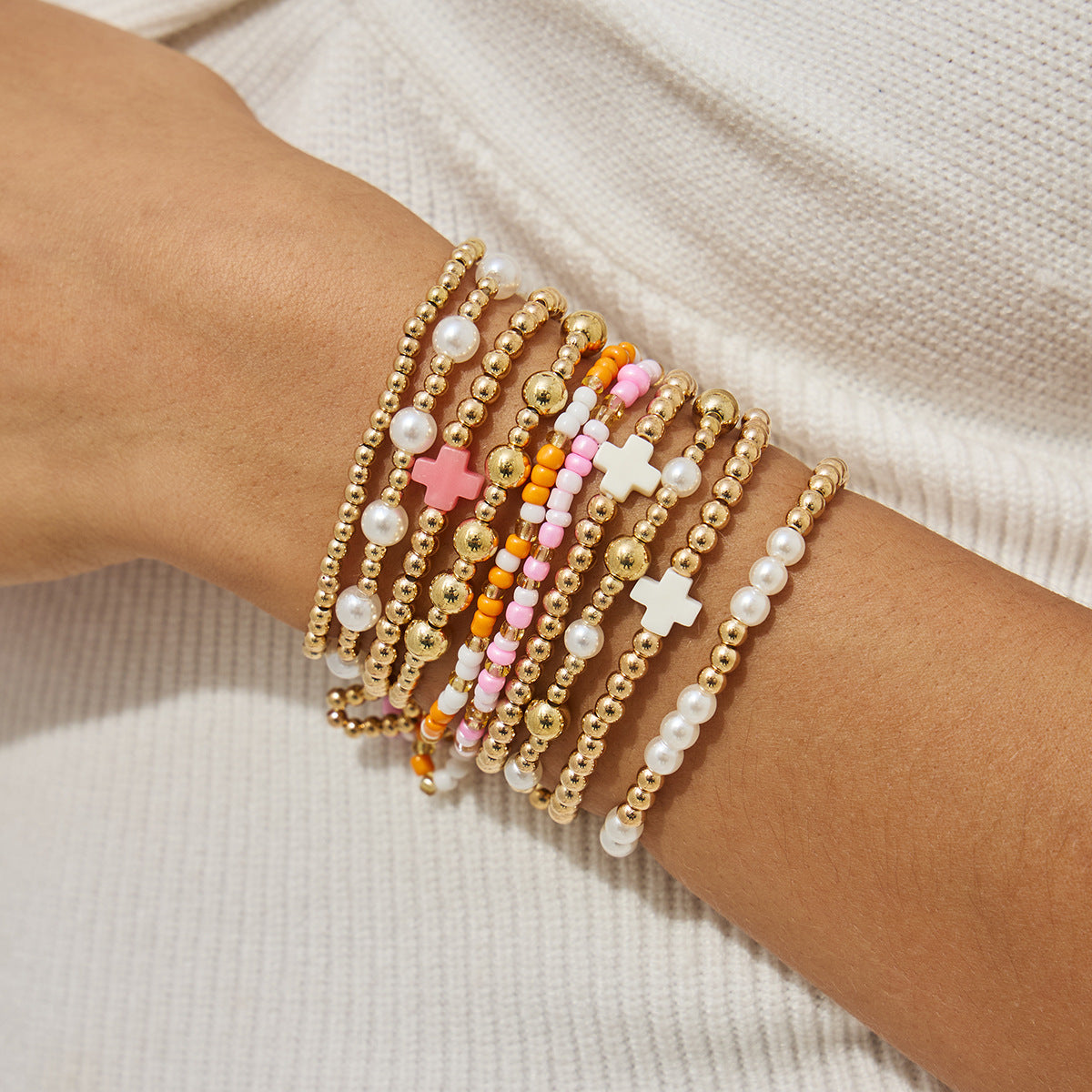 Bracciale da donna elastico in perline Bohemien con stella e croce, impreziosito da perle sintetiche e design irregolare