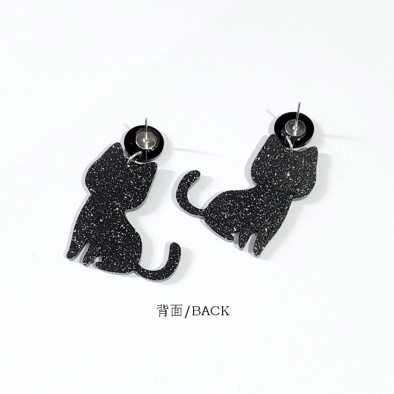 Pendientes de gato con temática de Halloween con ojos verdes y diseño de hueso Tachuelas acrílicas