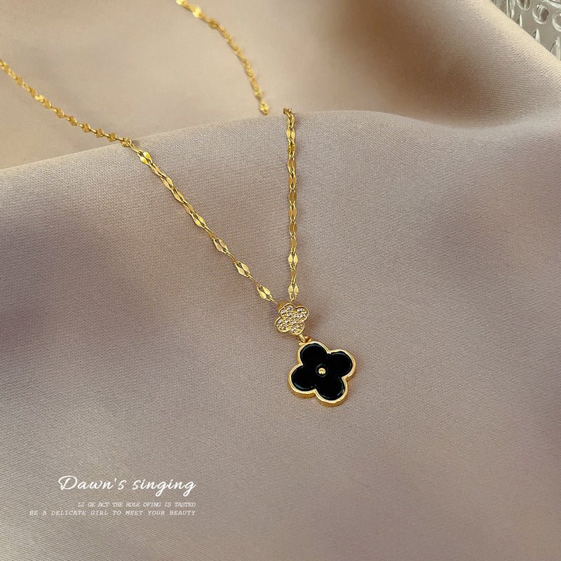 Minimalist Four-Leaf Clover Pendant Necklace in Titanium Steel with Micro-Pavé Zirconia and Fringe Detail