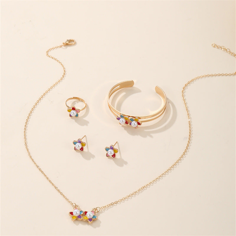 Set di collana, orecchini, bracciale e anello in lega con ciondolo floreale minimalista per ragazze