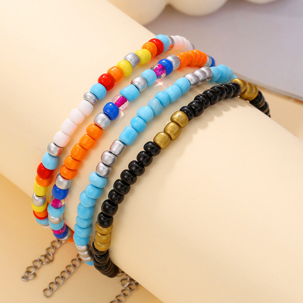 Braccialetto e Cavigliera Multi-strato Boho con Perline Rotonde Artigianali Accessorio Moda
