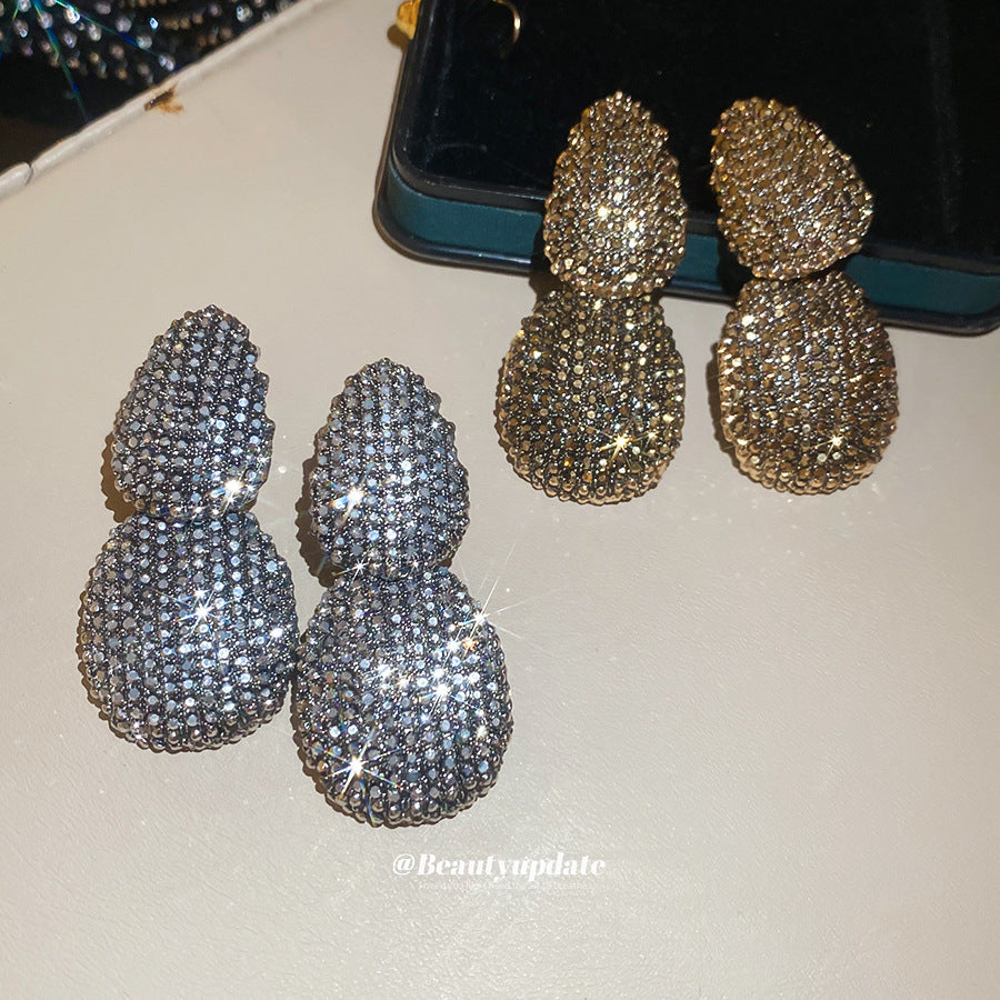 Orecchini a perno ovali geometrici vintage in lega con intarsio di strass da donna