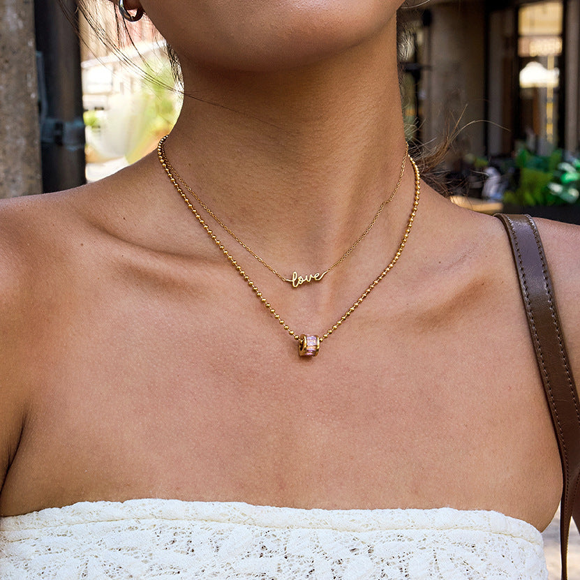 Collana con Ciondolo Geometrico Minimalista in Acciaio al Titanio Placcato per Donna