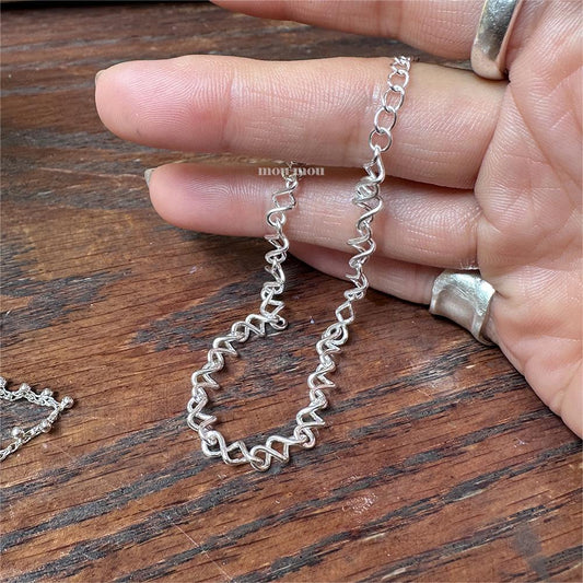 Bracciale Minimalista Geometrico a Torsione in Argento Sterling 925 con Finitura Placcata