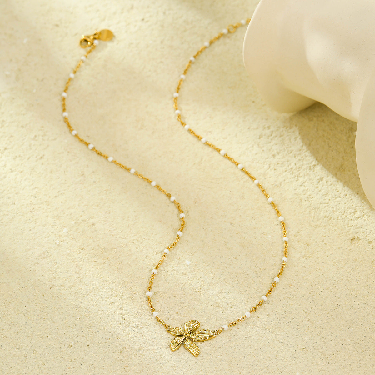 Collana con Pendente a Foglia e Petalo Minimalista alla Moda in Acciaio al Titanio con Finitura Placcata per Donna