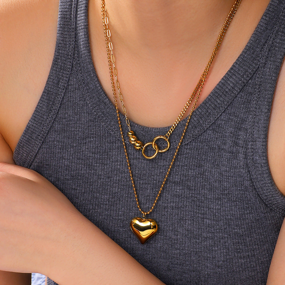 Collana con Pendente a Cuore Minimalista in Acciaio al Titanio con Placcatura in Oro 18K su Catena in Acciaio Inossidabile da Donna