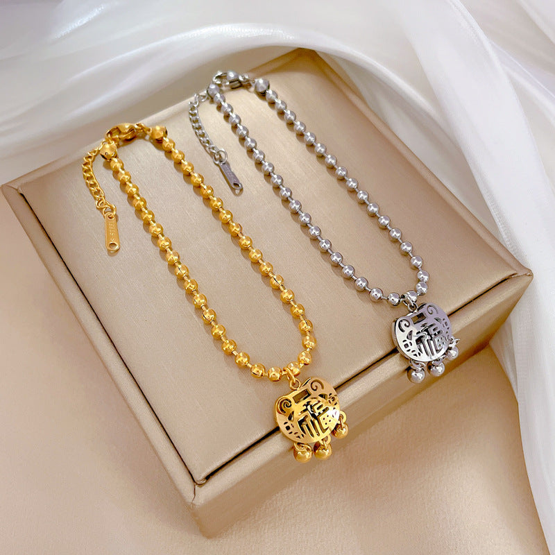 Pulsera de titanio chapada en oro con diseño de cierre Feng Shui para la longevidad, inspirada en Corea, con cuentas redondas y temática de la naturaleza para mujer