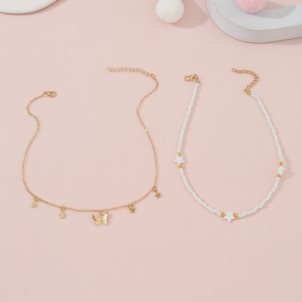 Set di collane in lega a forma di stella minimalista per bambine con catena di perline rotonde e finitura artigianale