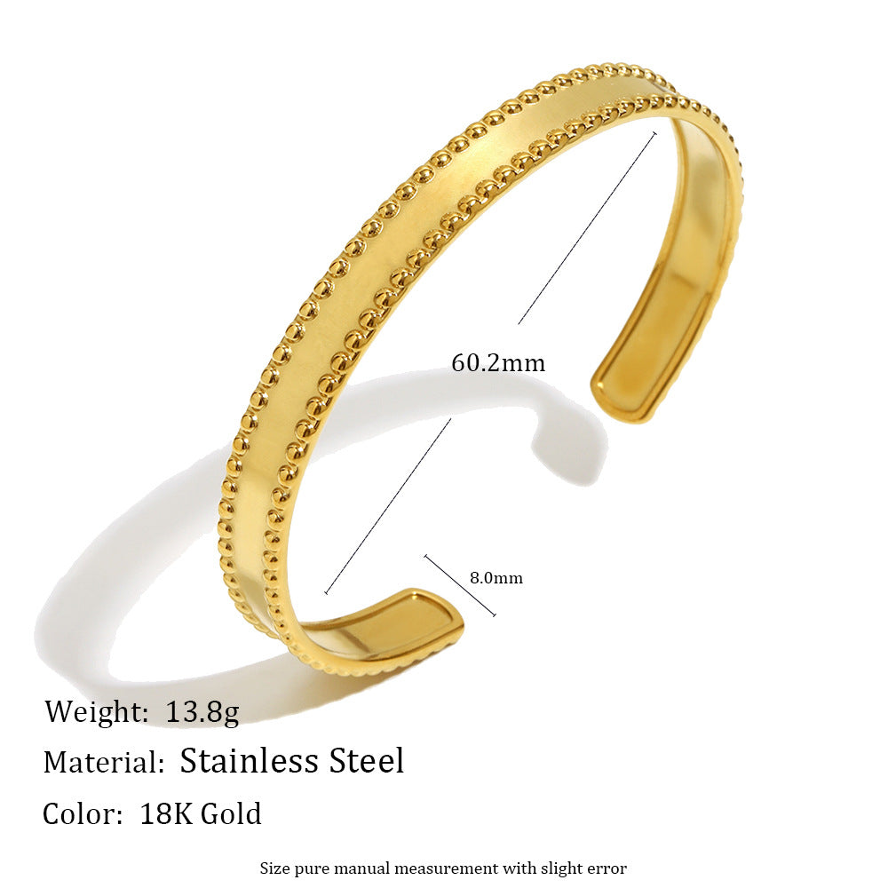 Pulsera de acero inoxidable con corazón hueco de estilo francés minimalista, chapado en oro de 18 quilates y líneas de acento de circonita