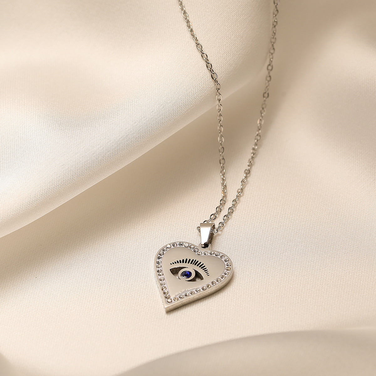 Collana con Pendente a Cuore Minimalista in Acciaio al Titanio con Intarsio di Zirconi da Donna
