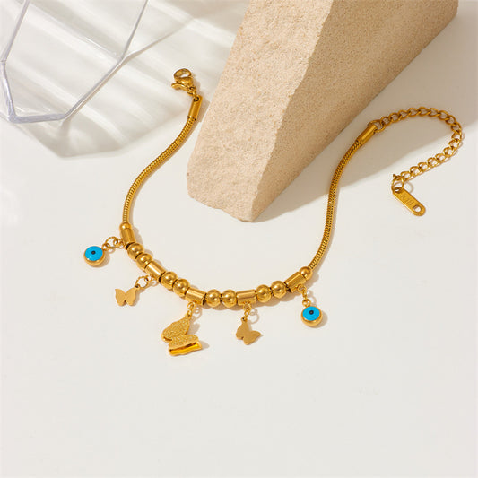 Elegante bracciale con ciondolo a farfalla in acciaio al titanio, perline geometriche e occhi smaltati blu per donna