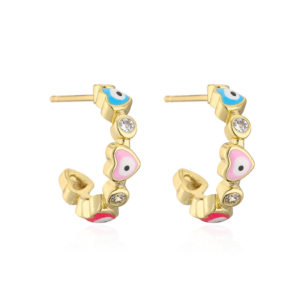 Geometric Style Copper Earrings with 18K Gold Plating and Micro-Paved Zirconia Heart-Eye C-Shaped Design for Women