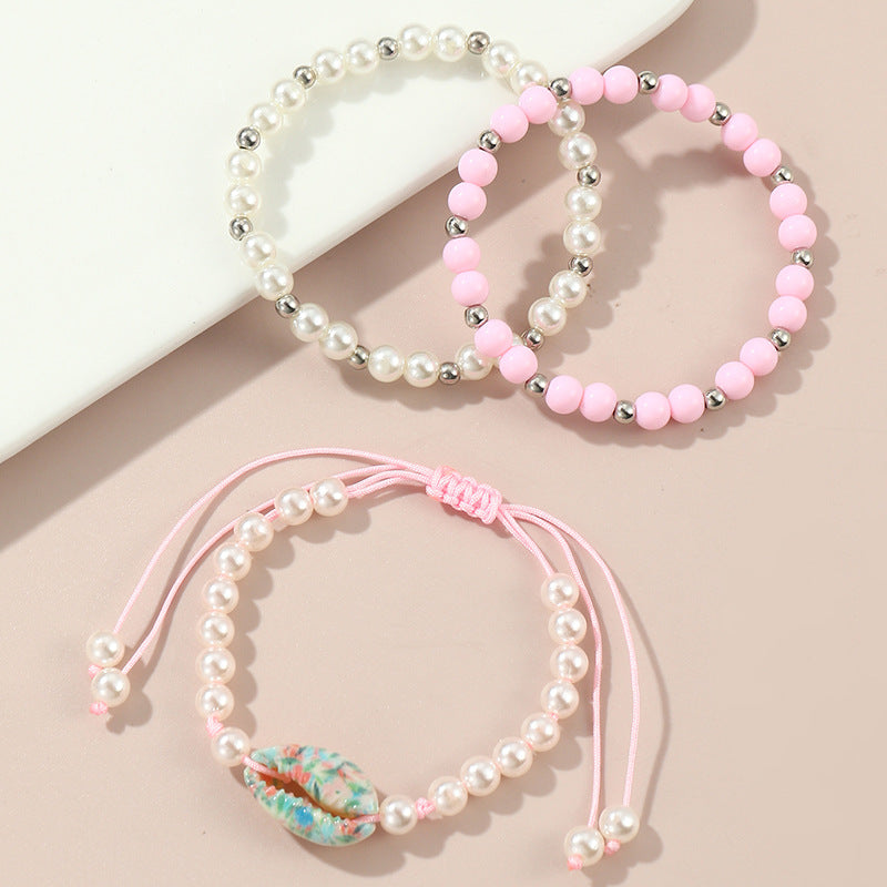 Minimalist Geometric Shell and Acrylic Beaded Bracelet Set for Children with Pink Pearlescent Finish