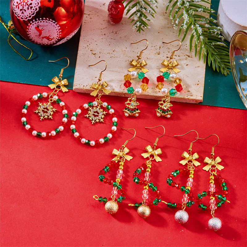 Aretes colgantes de Navidad con forma de estrella y campana para mujer, de aleación con acabado galvanizado, con motivos festivos de copos de nieve y árboles