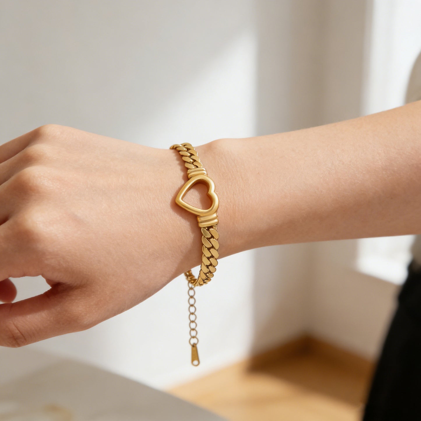 Elegante set collana e bracciale da donna in acciaio inossidabile placcato a forma di cuore