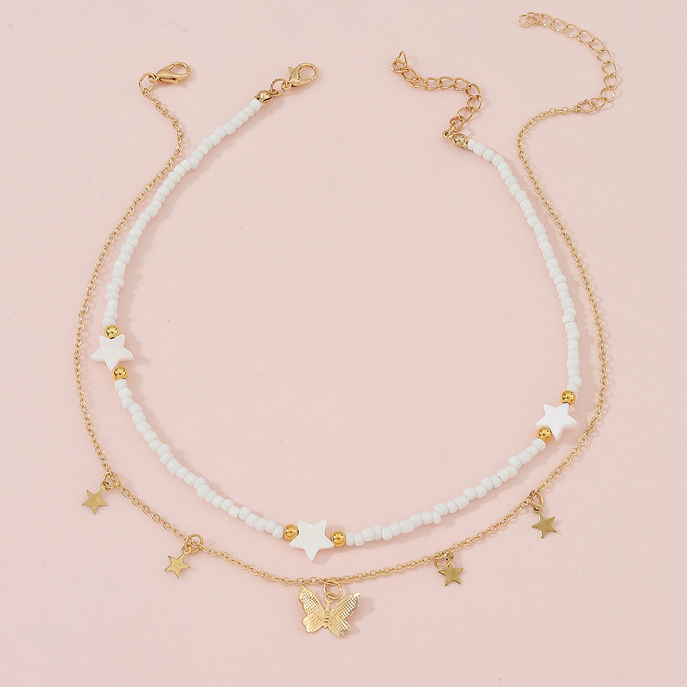 Set di collane in lega a forma di stella minimalista per bambine con catena di perline rotonde e finitura artigianale
