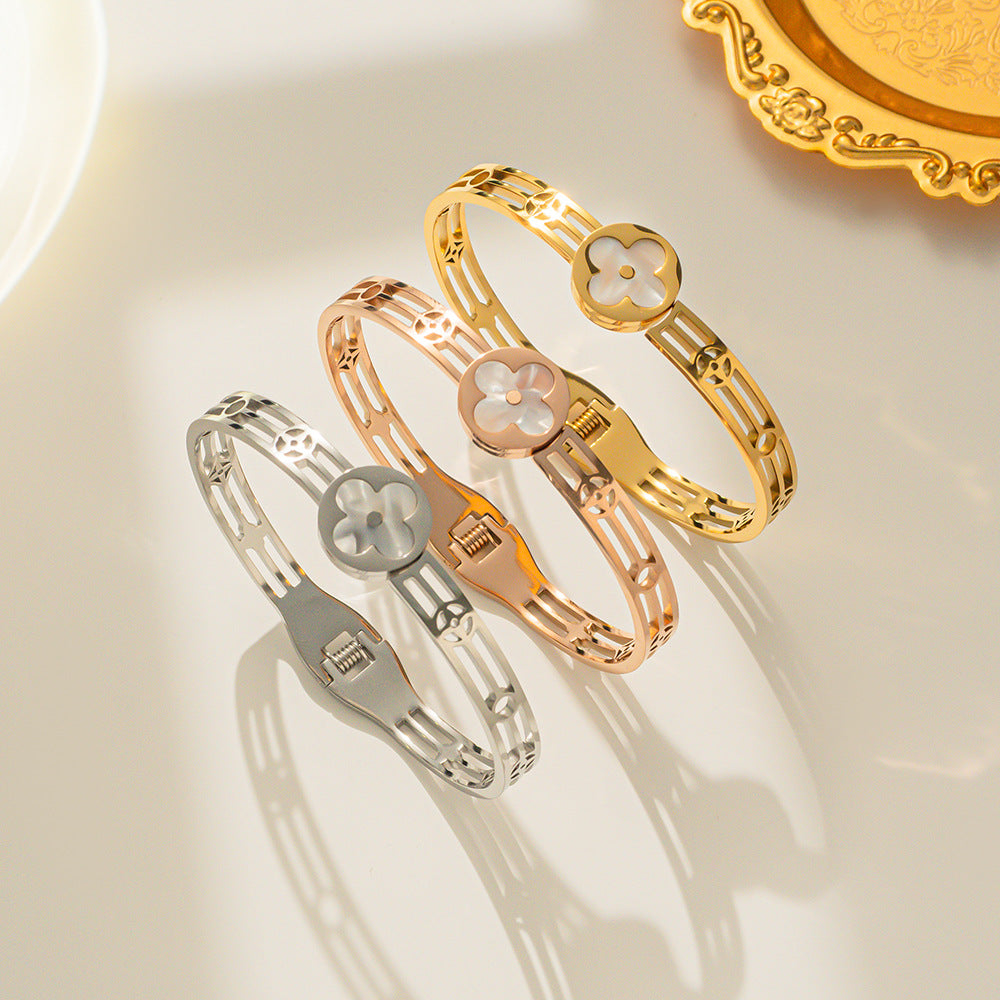 Luxury Style Four-Leaf Clover Shaped Titanium Steel Bracelet with Hollow-Out Design and White Shell Inlay for Women