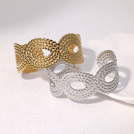 Bracciale minimalista traforato in acciaio inossidabile da donna con simbolo dell'infinito placcato in titanio, accessorio di moda di lusso