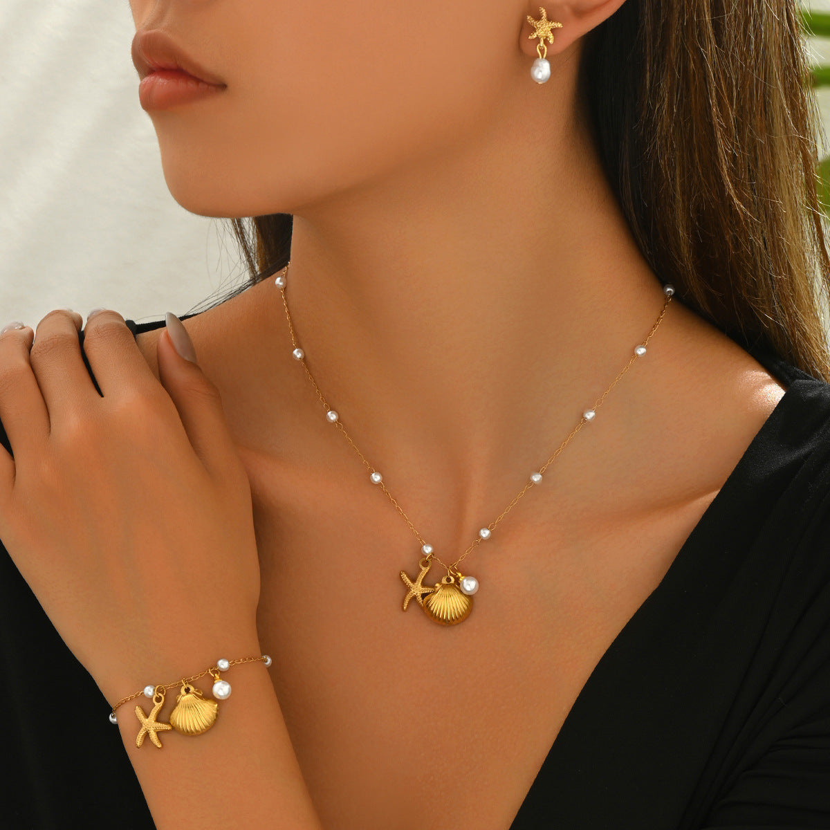 Conjunto de pendientes, pulsera y collar de mujer de conchas y perlas inspirado en el océano, con motivo de estrellas de mar y artesanía incrustada