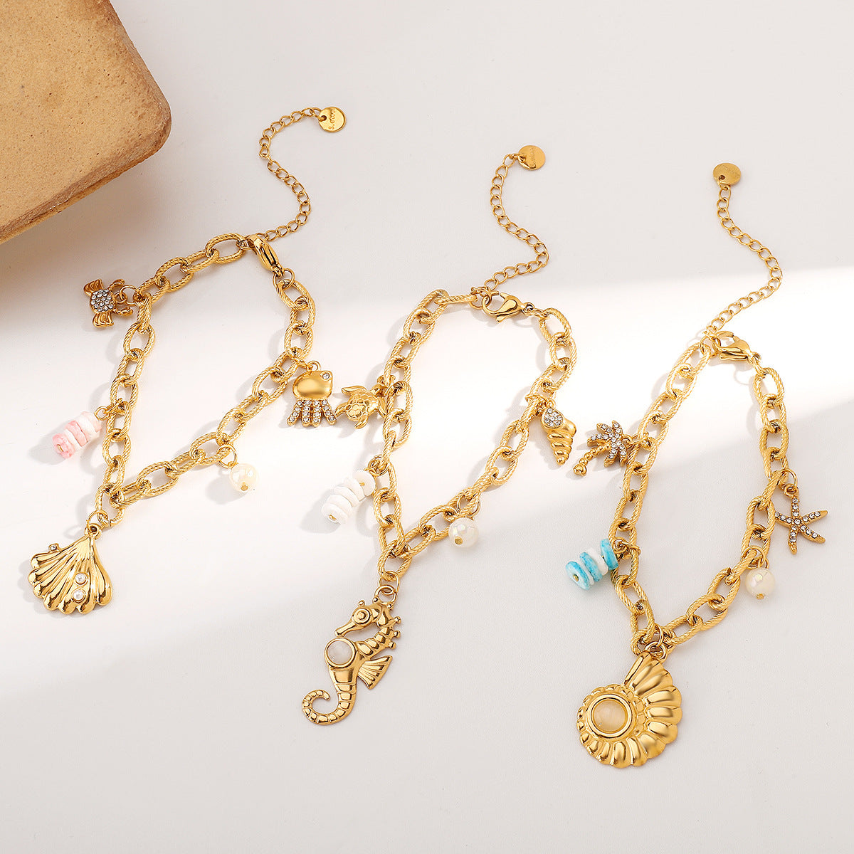Vacation Style Seashell and Seahorse Pendant Stainless Steel Bracelet for Women with Plated Finish
