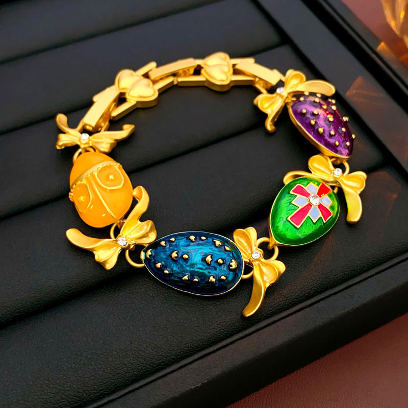 Collana pendente con fiocco floreale vintage in lega con intarsio di strass e finitura smaltata da donna