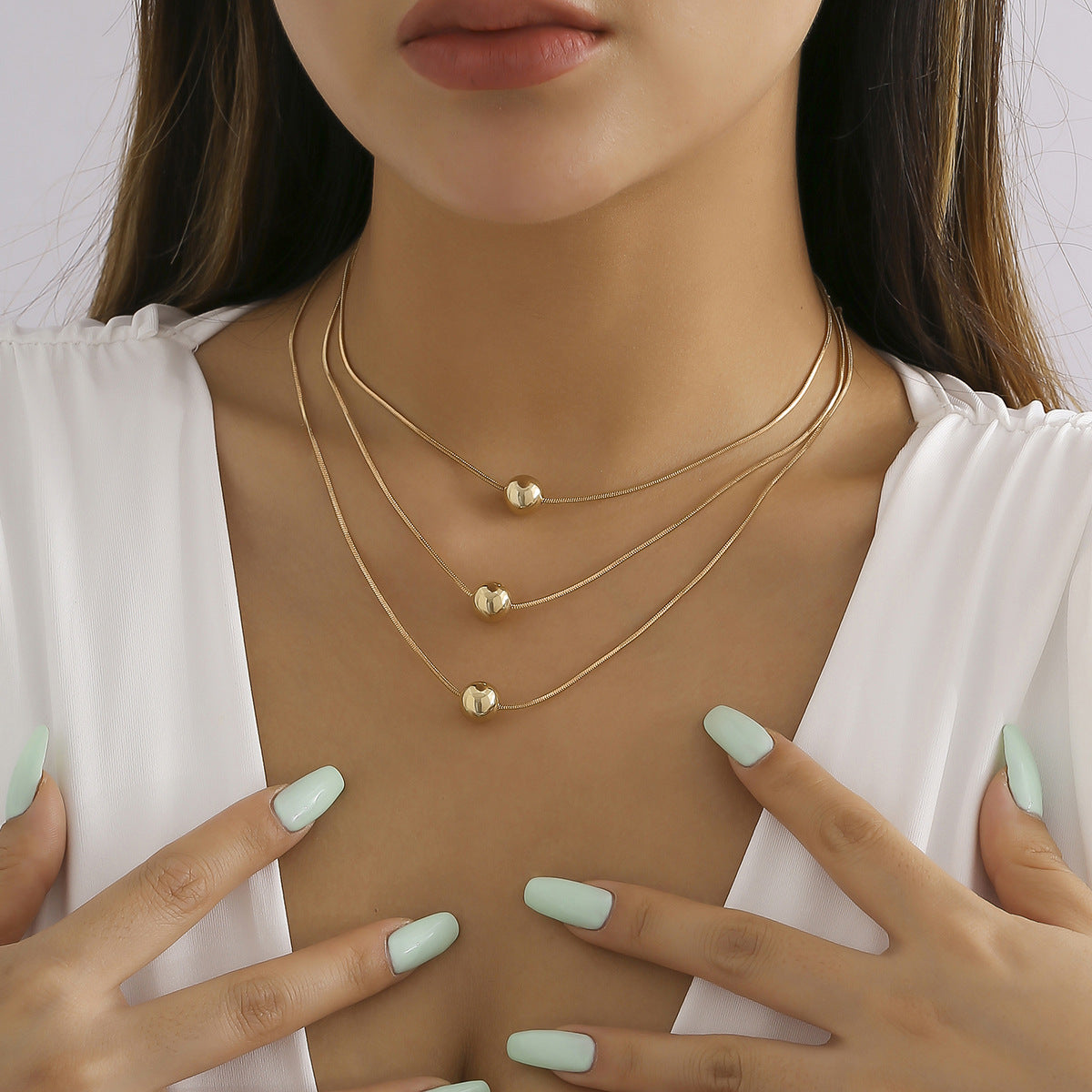Collana pendente geometrica stile punk da donna con catena a serpente multistrato e struttura in metallo