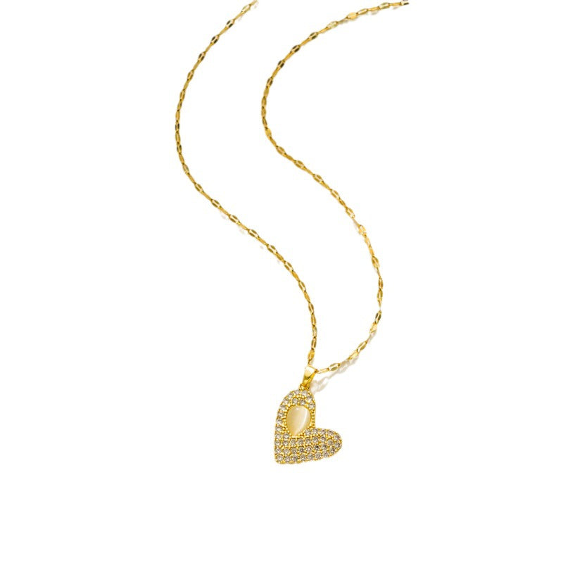Collar de Lujo Minimalista en Acero de Titanio con Corazón, Incrustaciones de Ojo de Gato y Detalles de Circonita Cúbica para Mujer