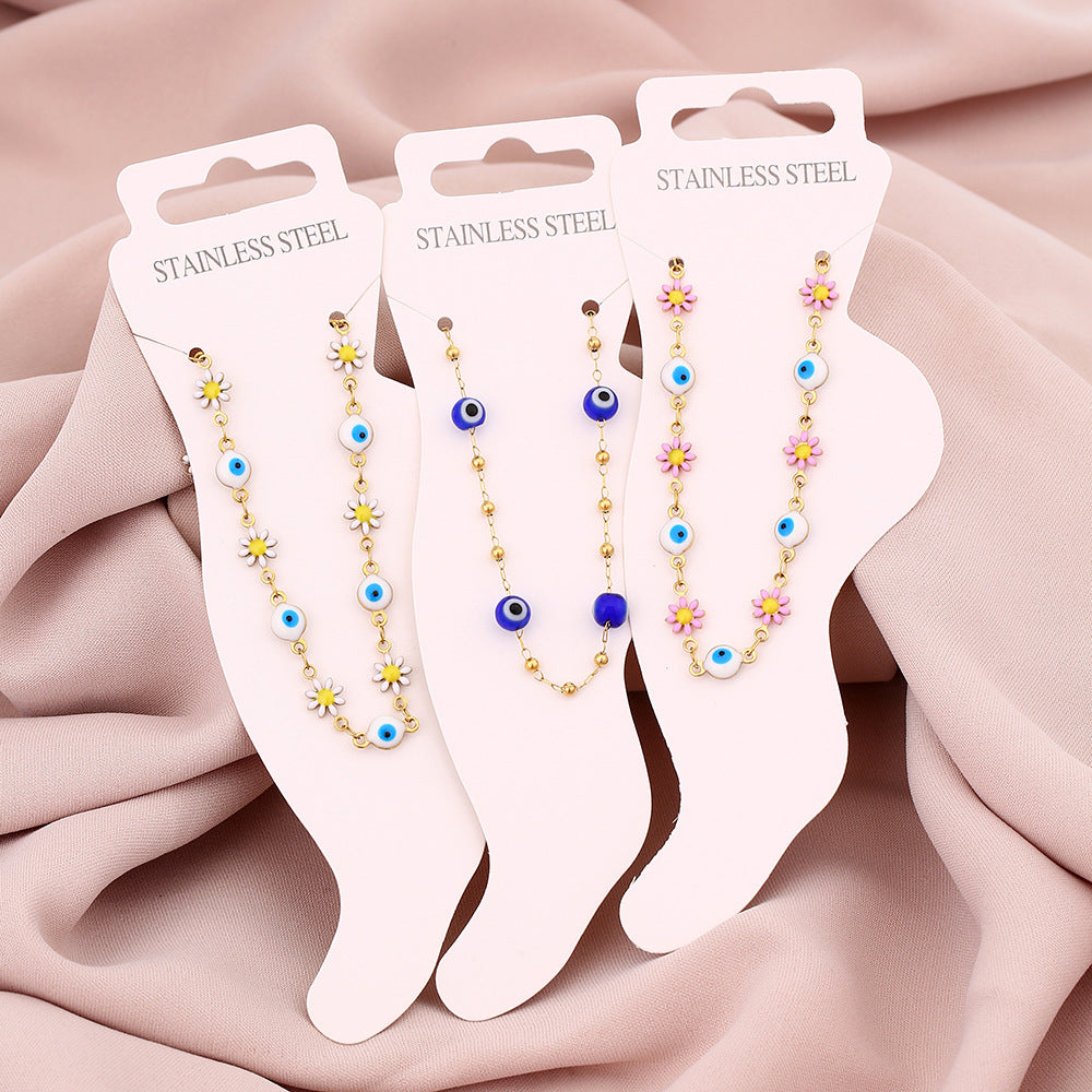 Elegante cavigliera geometrica in acciaio inossidabile da donna con motivo a petalo e occhio, accessorio di moda di lusso minimalista