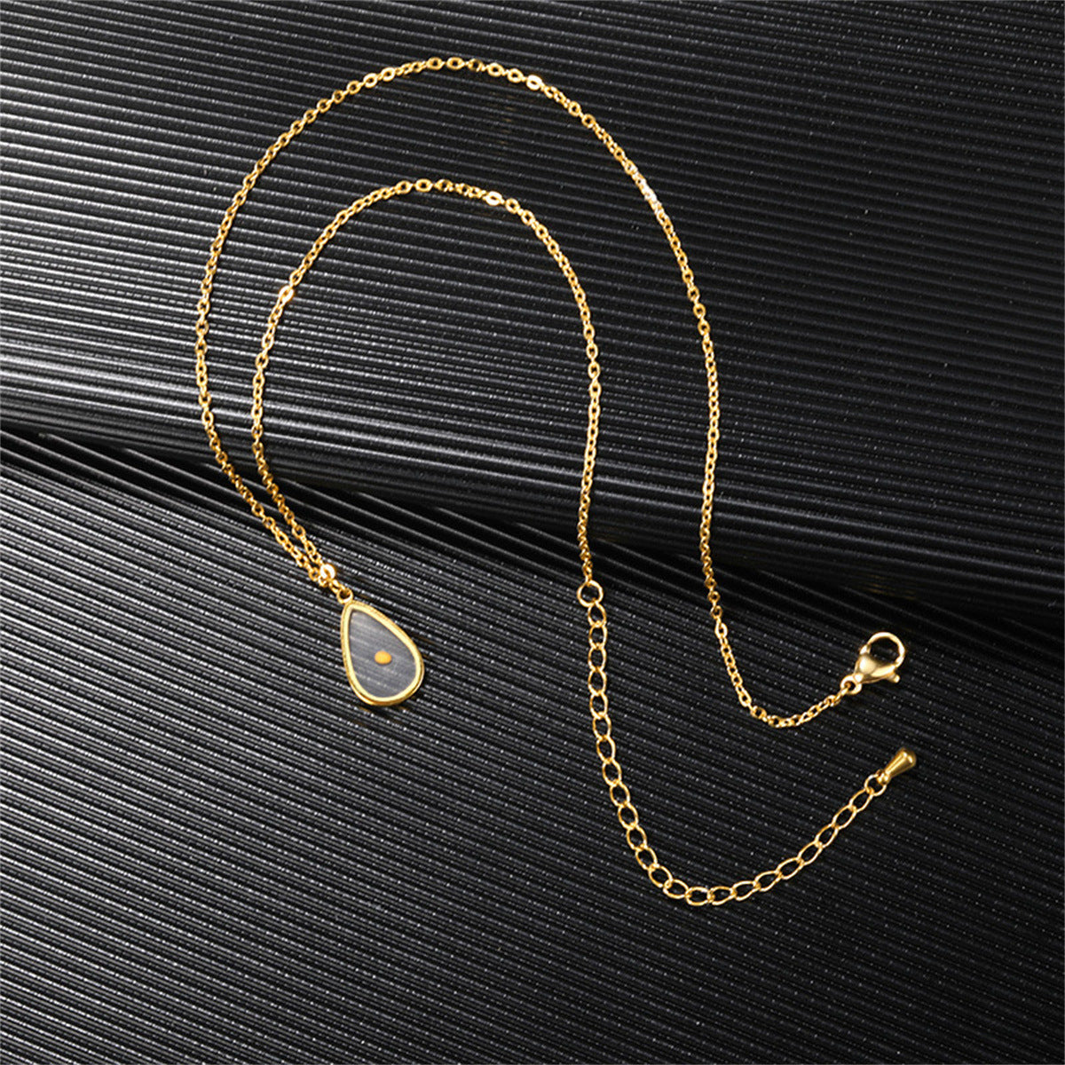 Minimalist Oval Time Pendant Necklace in Stainless Steel with Titanium Steel Charm and Electroplated Finish for Unisex Everyday Wear