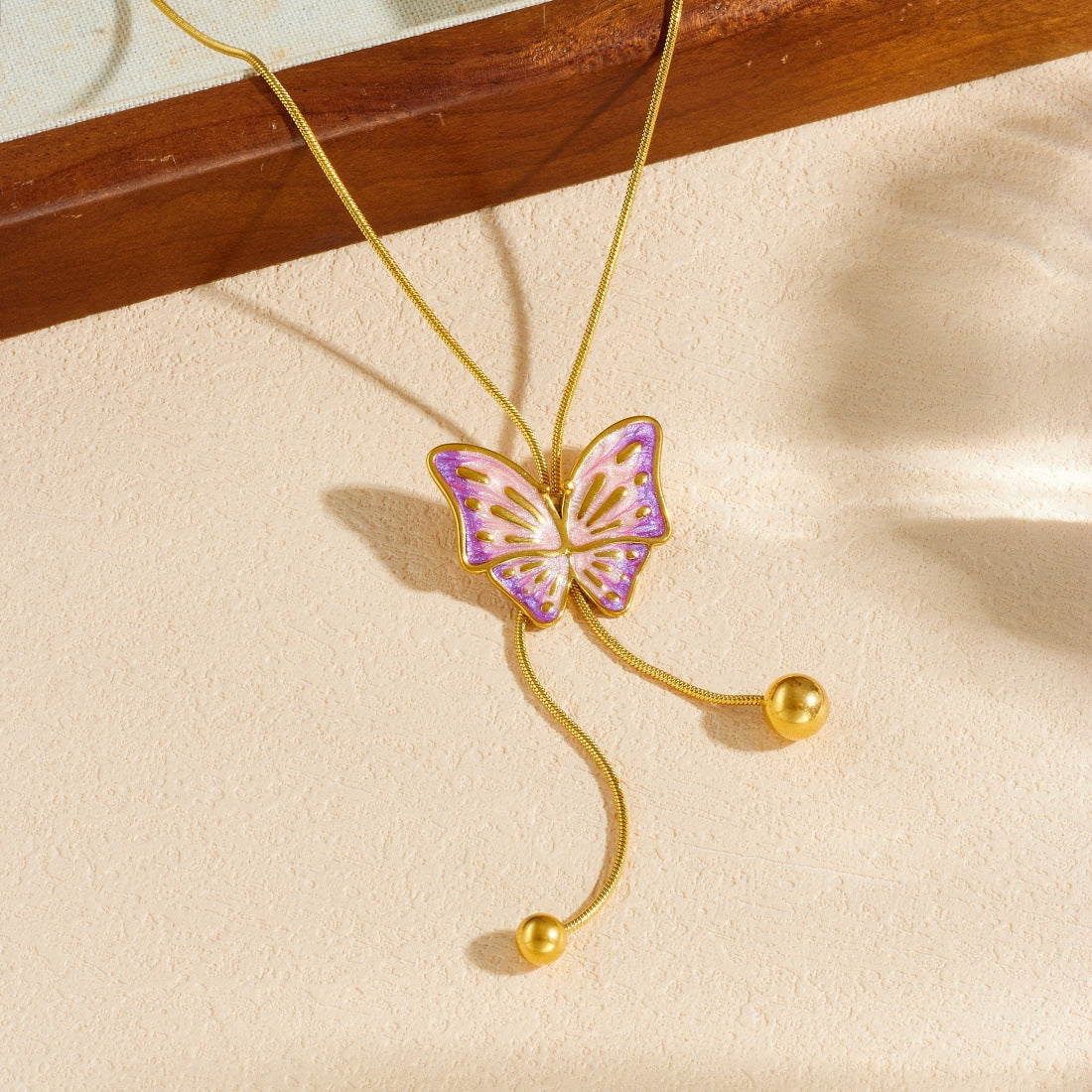 Minimalist Pink Purple Gradient Butterfly Drip Oil Plated Stainless Steel Necklace with Tassel and Gold Beads