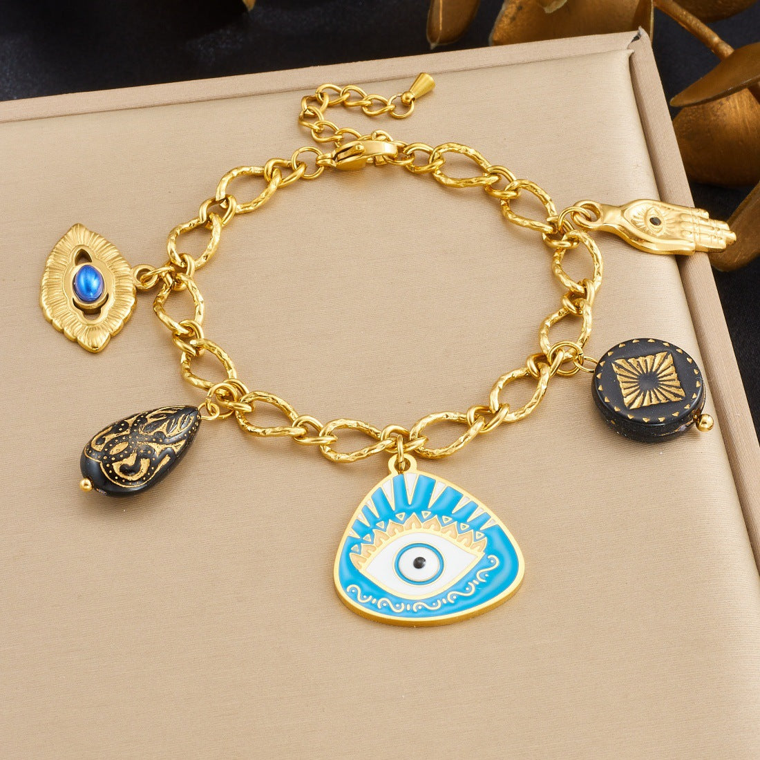 Fashion Geometric Drip Oil Plated Stainless Steel Bracelet with Irregular Blue Eye Palm Pendant for Women